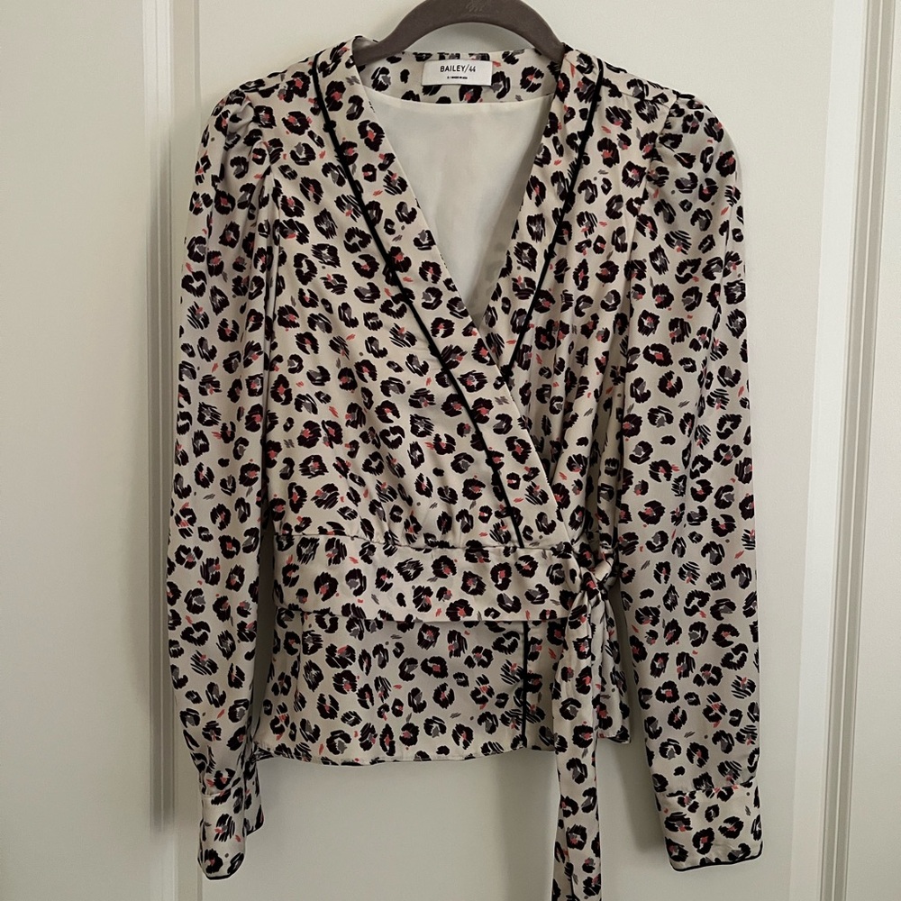 Bailey 44 leopard print wrap shirt with peplum.